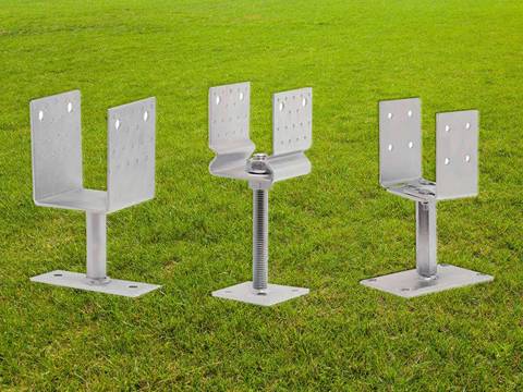 Three different types of post support on the grassland.